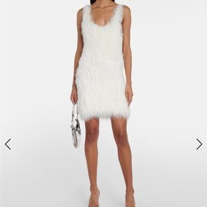 Coperni feather mini dress. ICONIC